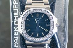 Patek Philippe Nautilus – Ref. 5713/1G-001, Gebraucht – 3/20