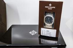 Patek Philippe Nautilus – Ref. 5713/1G-001, Gebraucht – 7/20
