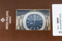 Patek Philippe Nautilus – Ref. 5713/1G-001, Gebraucht – 17/20